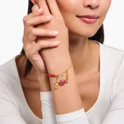 Thomas Sabo Armbänder-Member Charm Armband rote Beads und Gliederelemente vergoldet - A2130-427-10